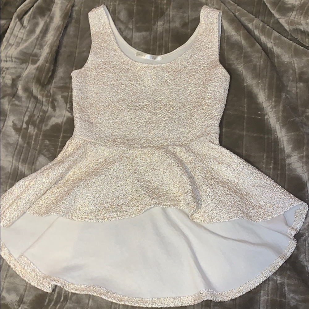 A white and gold shirt white floral long bottom